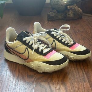 Nike Sneakers with Pink, Black, and White Design
